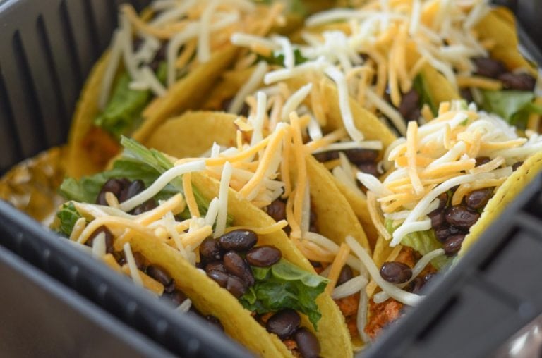 Homemade Air Fryer Turkey Tacos with lettuce, beans, cheese and salsa