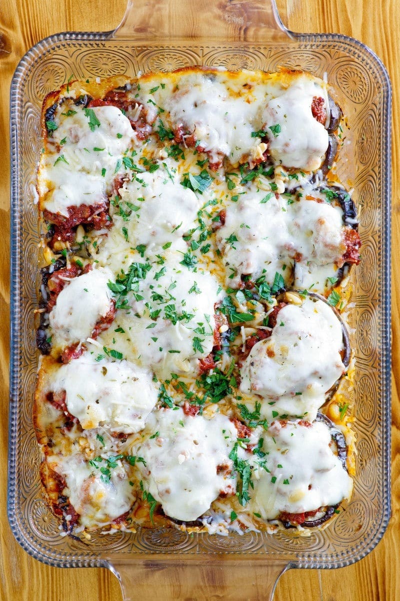 Beef and eggplant casserole with ground beef, eggplant, onion, garlic, and fresh herbs.