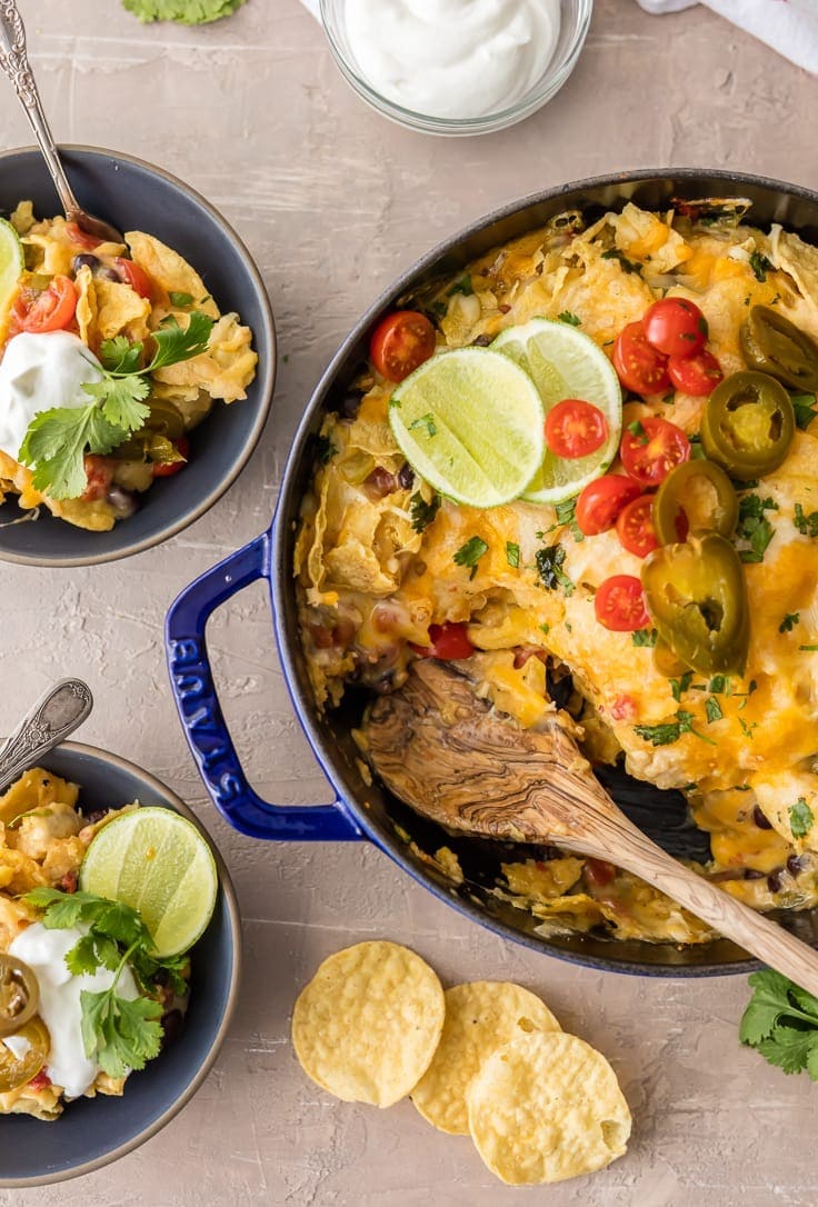 Mexican nacho casserole: A delicious and flavorful dish made with layers of tortillas, seasoned chicken, cheese, and enchilada sauce