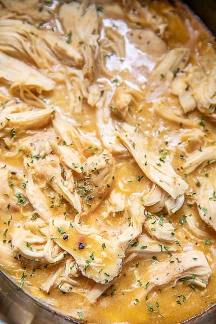 Close up view Crockpot Chicken & Gravy with unsalted cream of chicken soup