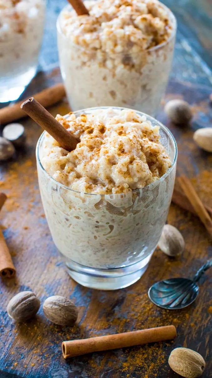 Rice pudding in a glass with sprinkles of cinnamon powder.