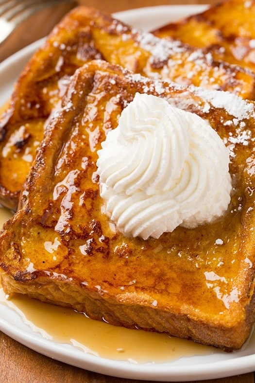 Pumpkin French toast with syrup and vanilla.