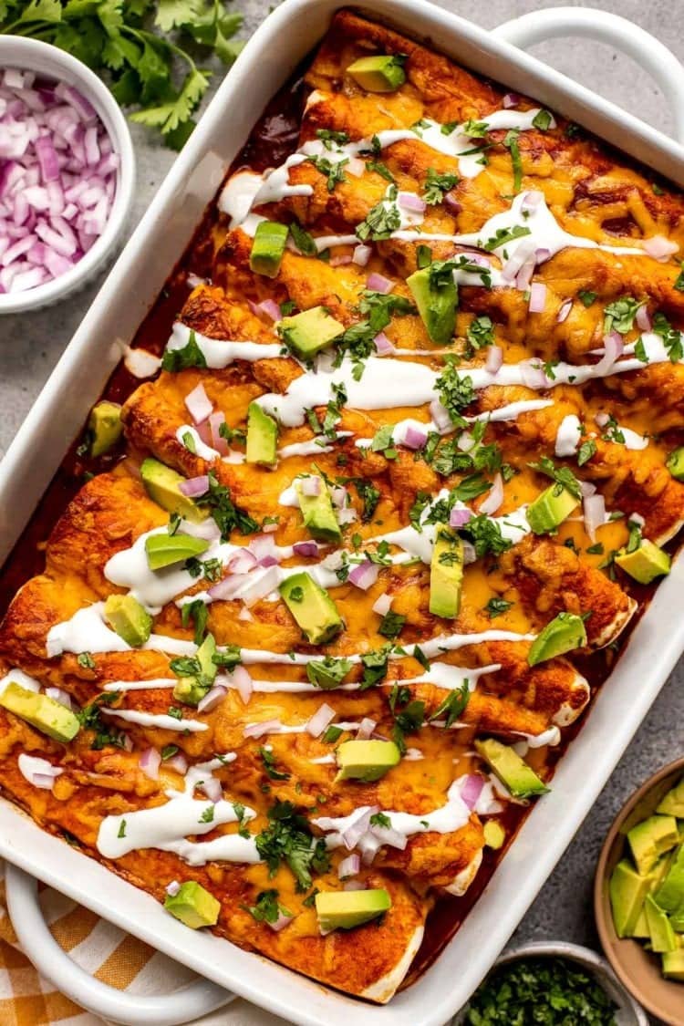 Chicken enchiladas with avocado and lime.